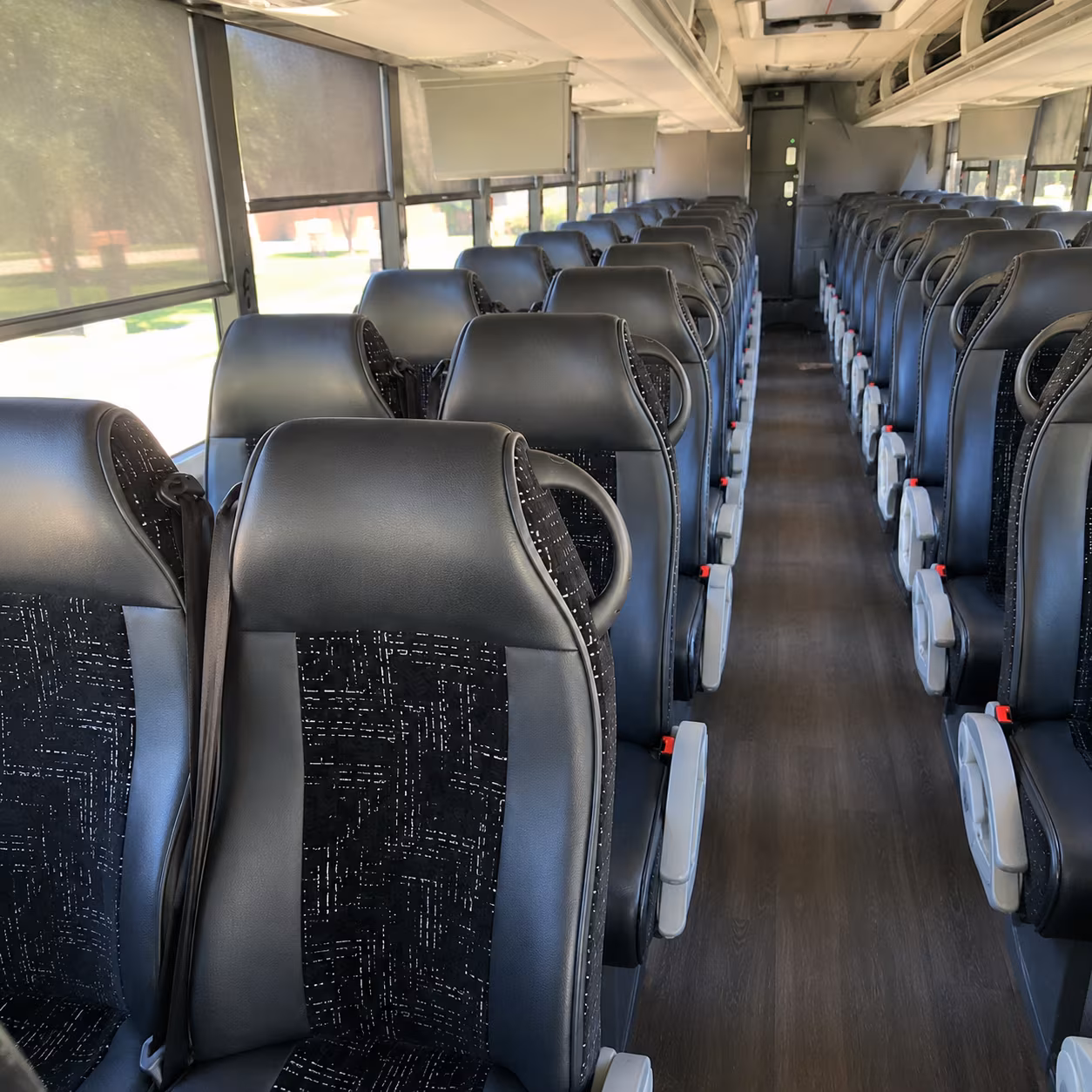 book a charter bus from canton to michigan international speedway race weekends